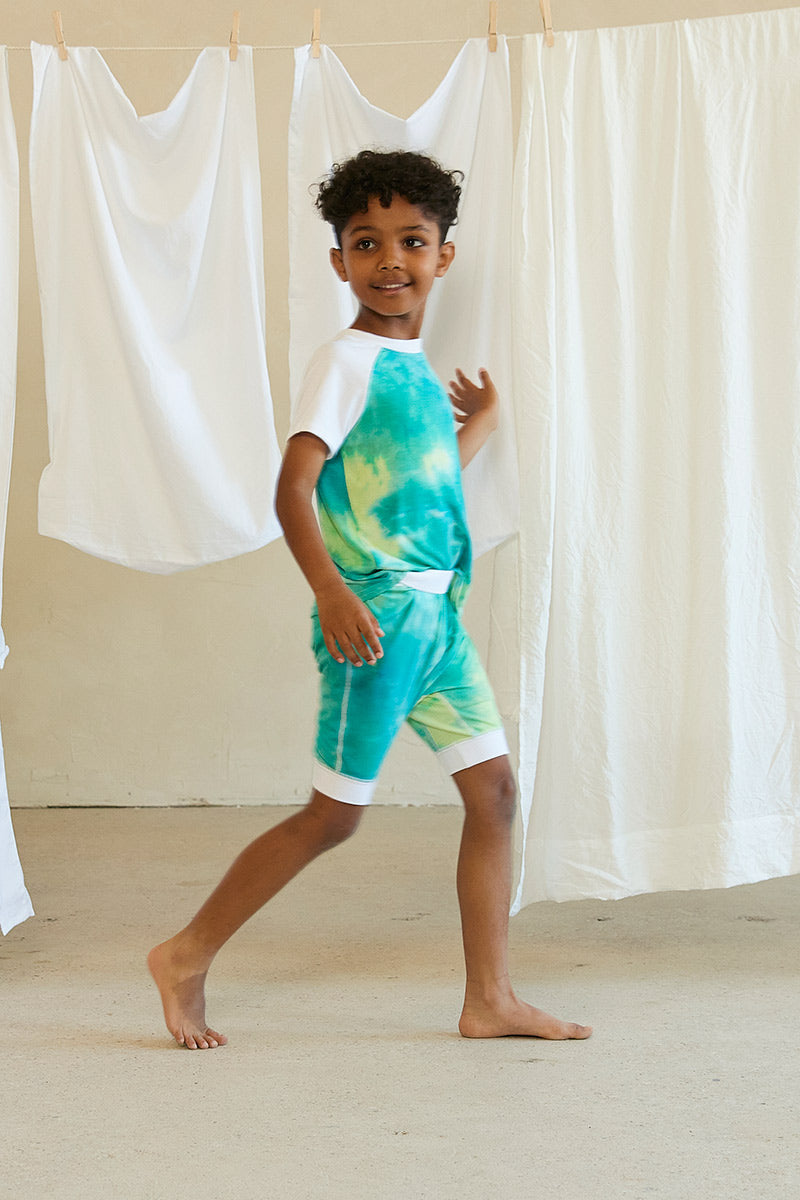 Nayron is 7 years old, 4'0" tall and is wearing a size 5/6