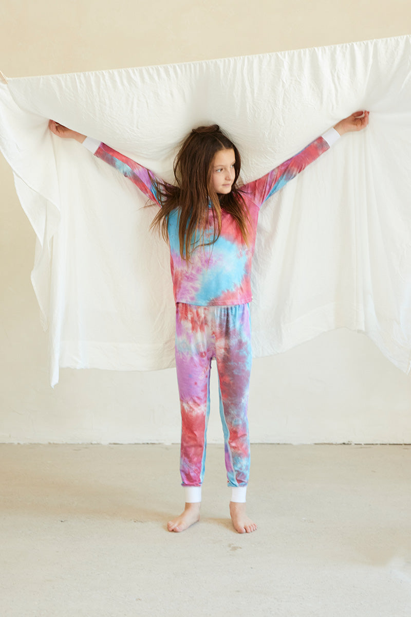 Tessa is 9 years old, 4'7" tall and is wearing a size 7/8