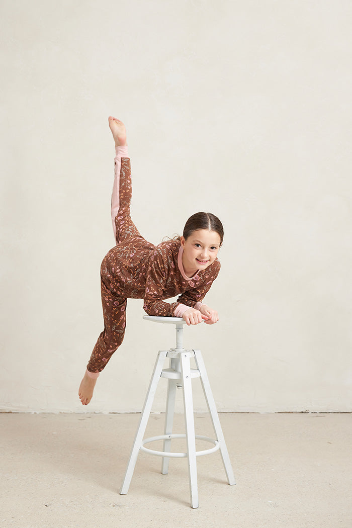 Tessa is 8 years old and is wearing a size 7/8