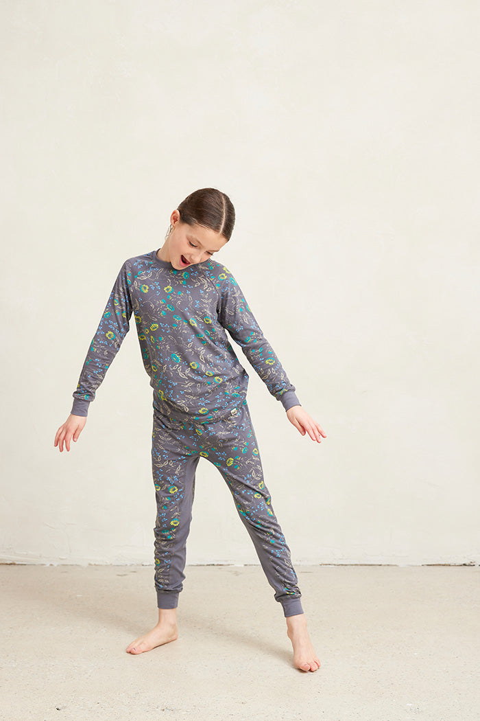 Tessa is 8 years old and is wearing a size 7/8