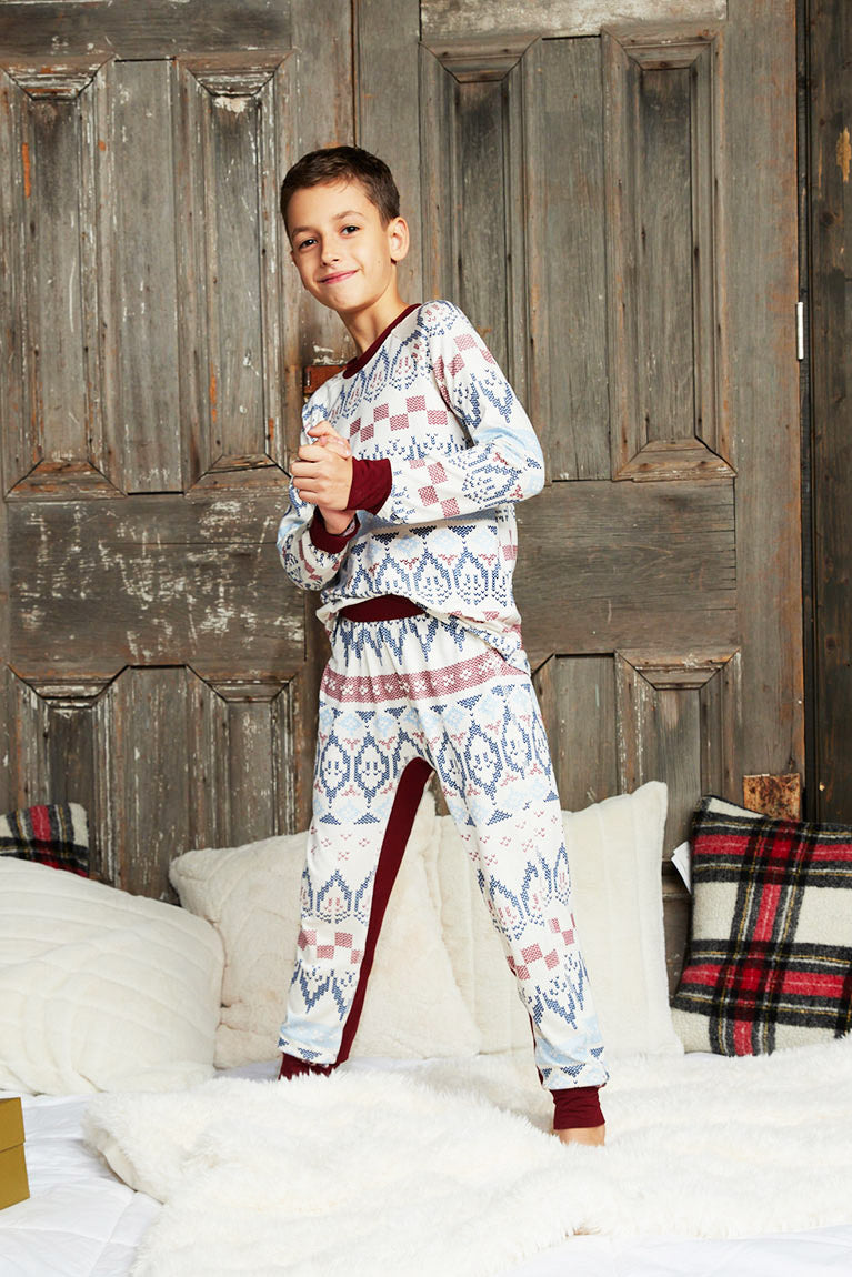 Gus is 8 years old, 4'5" tall and is wearing a size 7/8