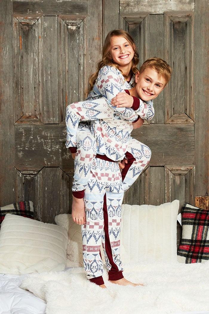 Hank is 11 years old, 4'8" tall and is wearing a size 11/12. Coco is 8 years old, 4'6" tall and is wearing a size 9/10.