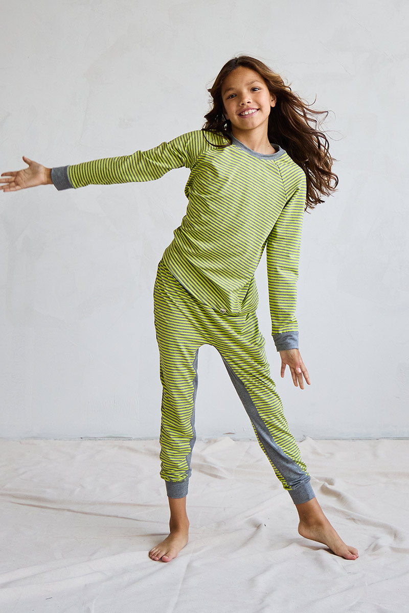 Ava is 10 years old, 4'11" tall and is wearing a size 9/10