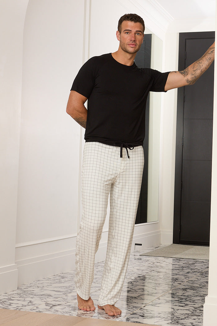 Adam is 6'1", typically wears a size 34 pant, has a 43" chest and a 32" inseam and is wearing a size medium