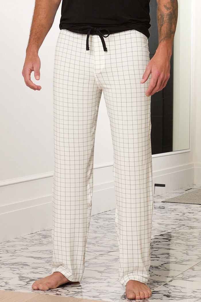 Adam is 6'1", typically wears a size 34 pant, has a 43" chest and a 32" inseam and is wearing a size medium