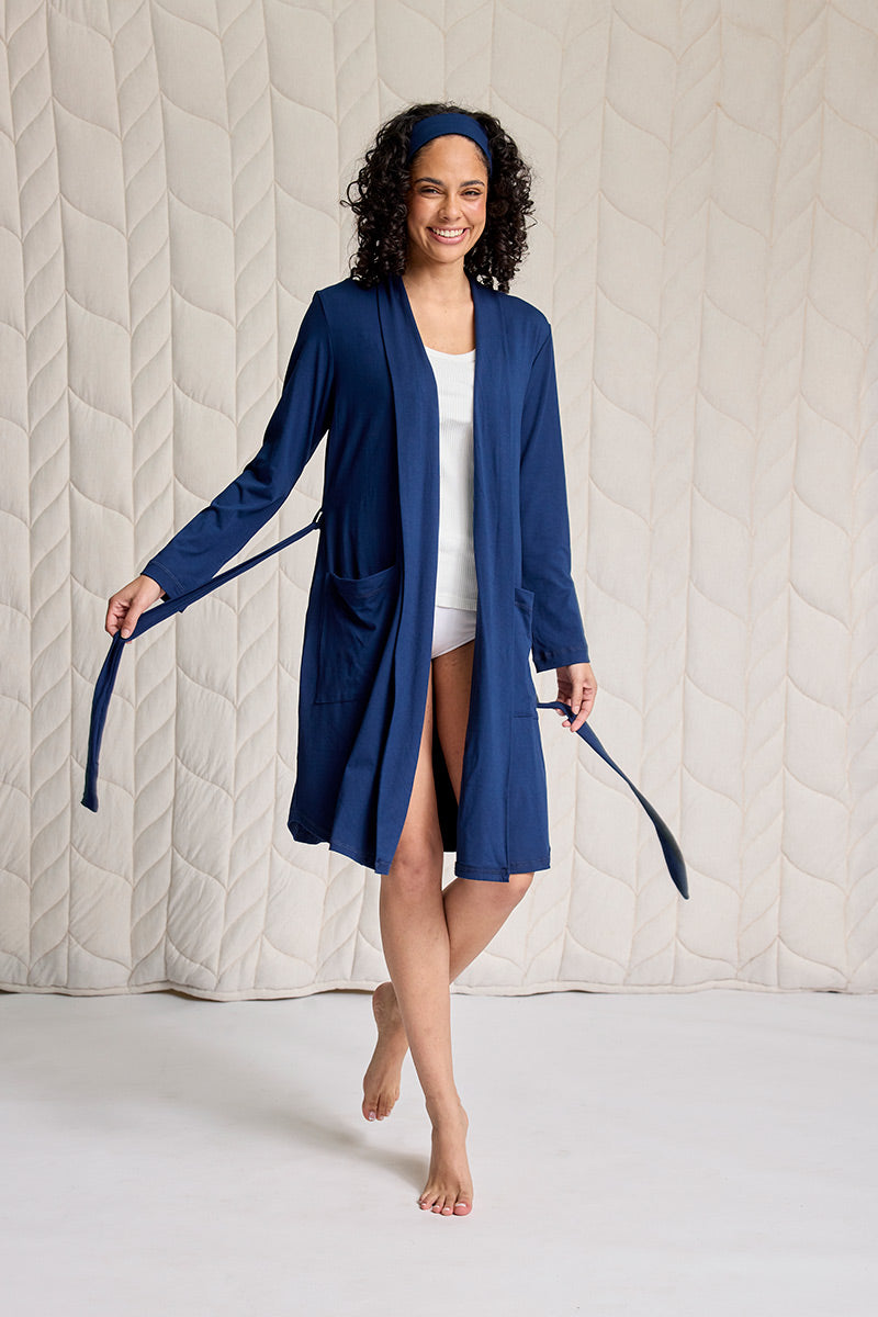 Adia is 5'7", typically wears a size 2 and is wearing a size SM/MD