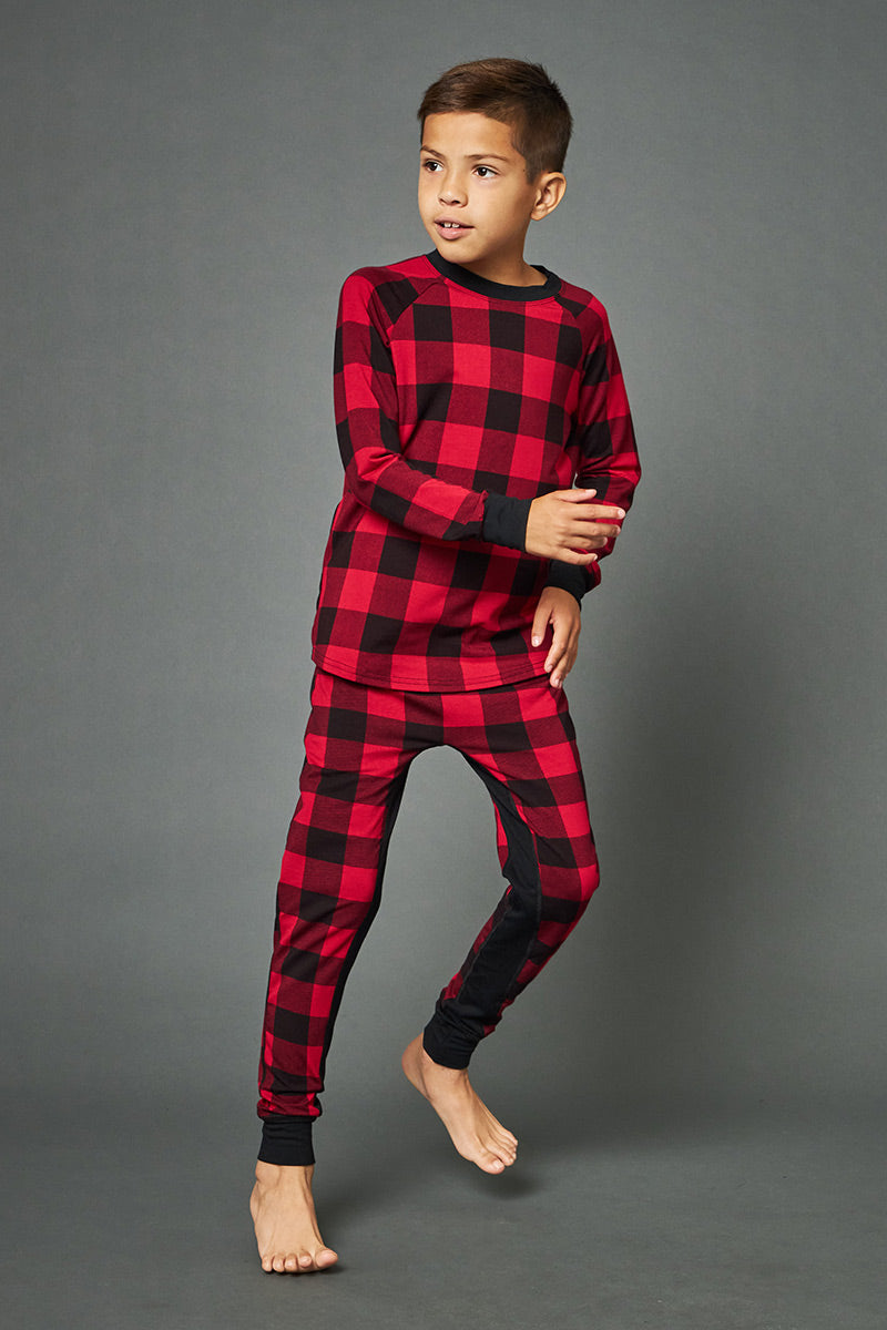 Marcus is 8 years old, 4'7" tall and is wearing a size 7/8