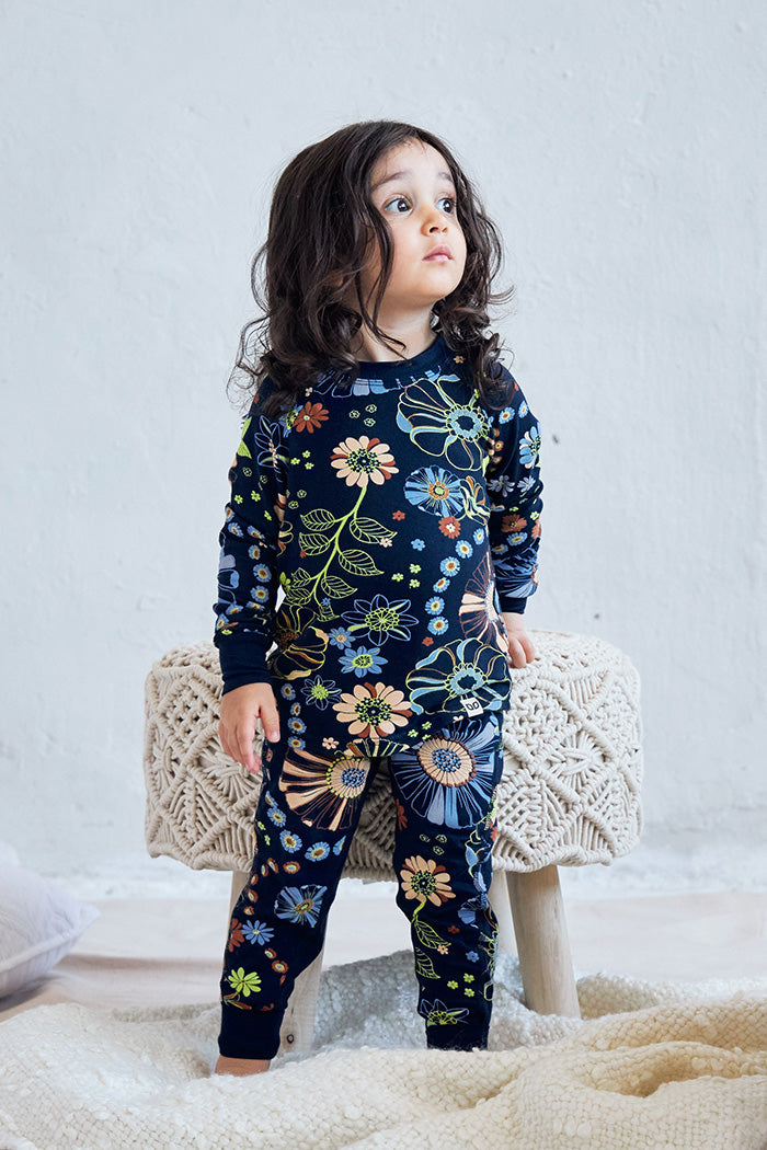 Aria is 2 years old, 2'0" tall and is wearing a size 1/2