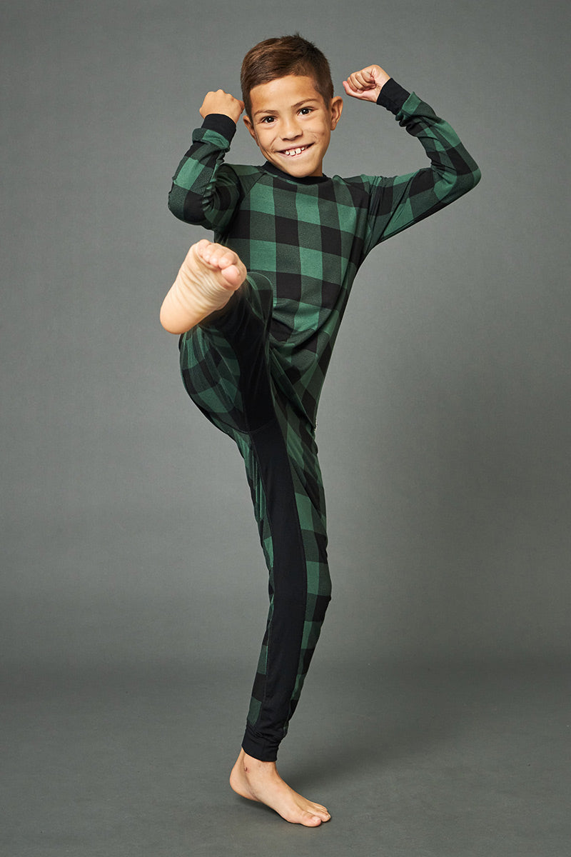 Marcus is 8 years old, 4'7" tall and is wearing a size 7/8