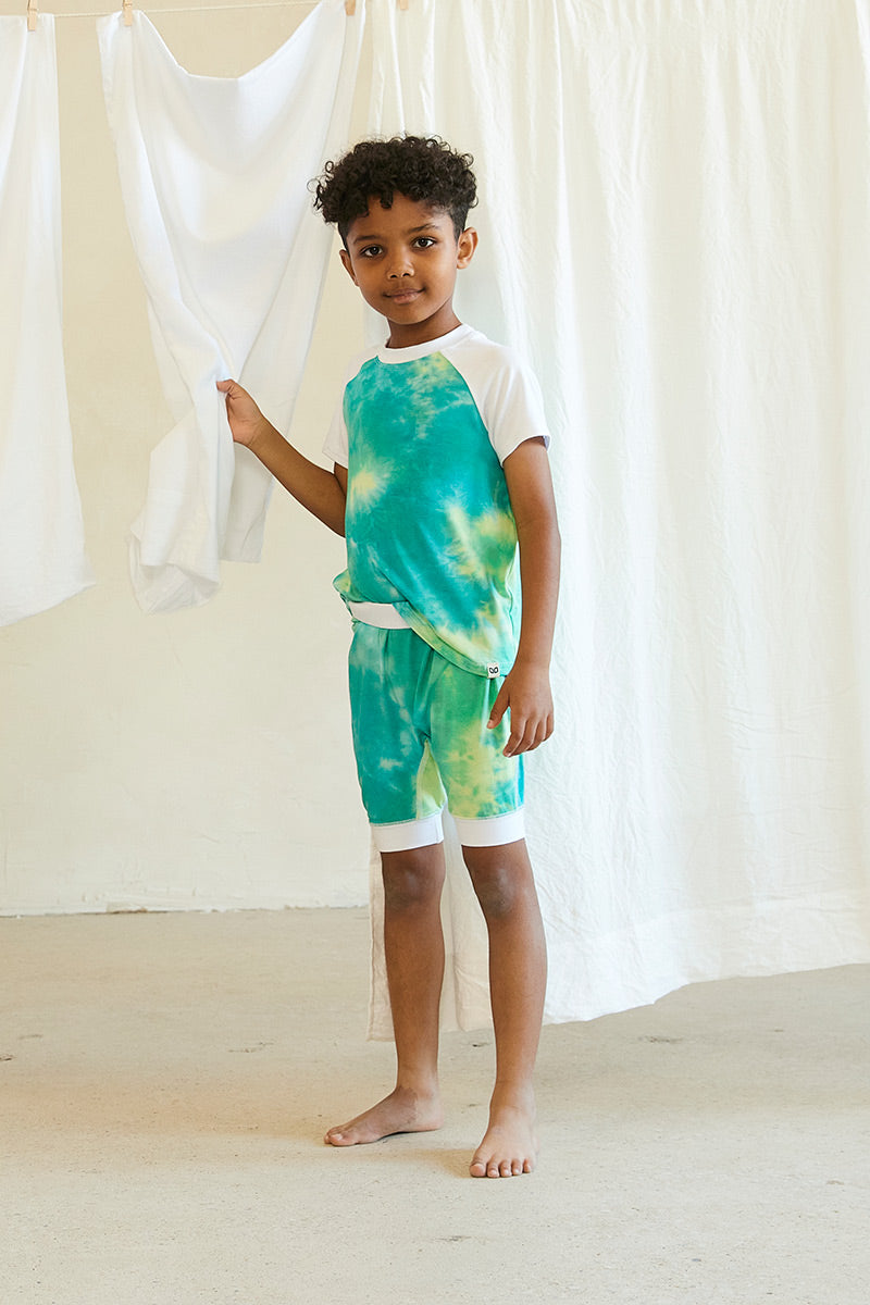 Nayron is 7 years old, 4'0" tall and is wearing a size 5/6