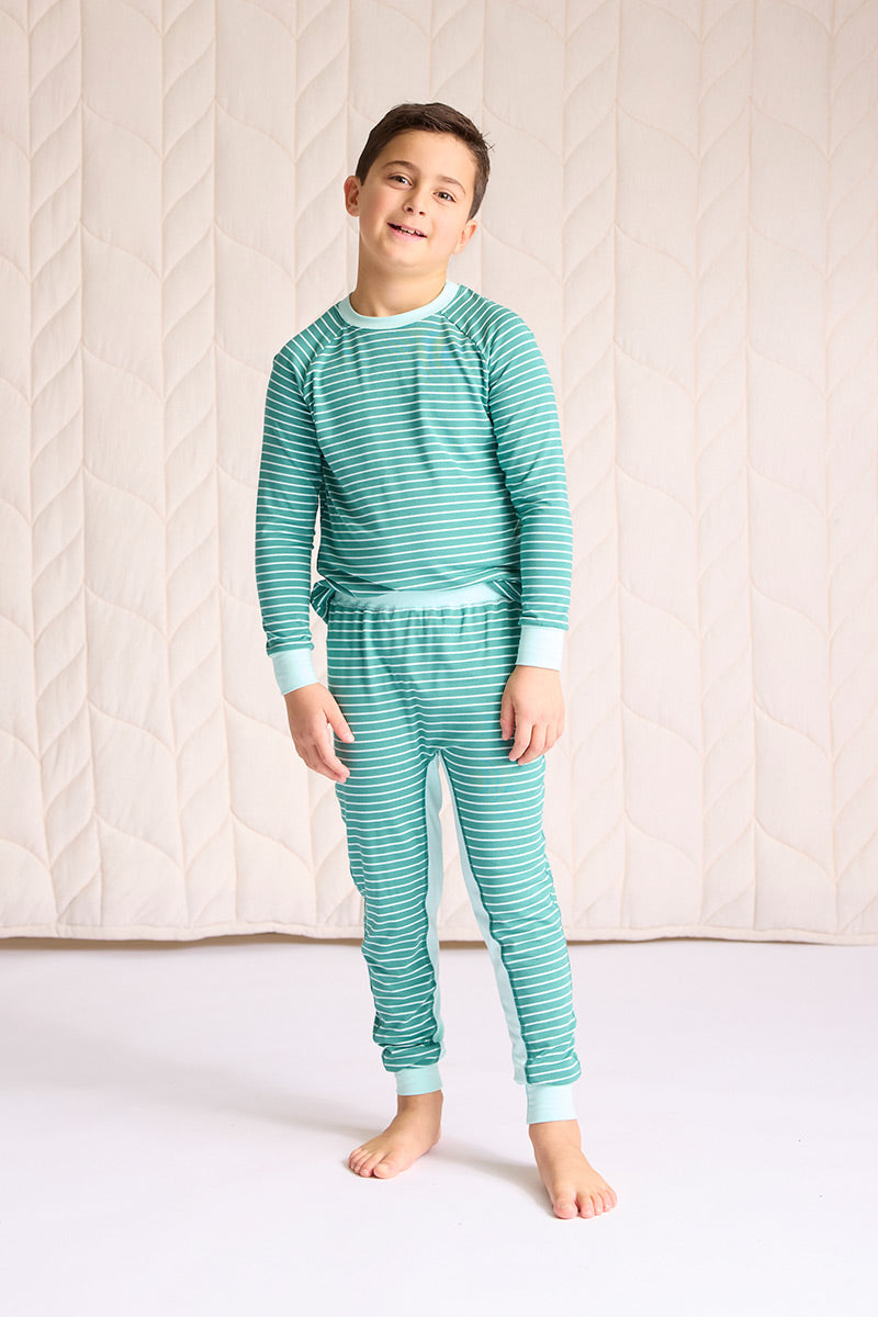 Ezra is wearing a size 7/8