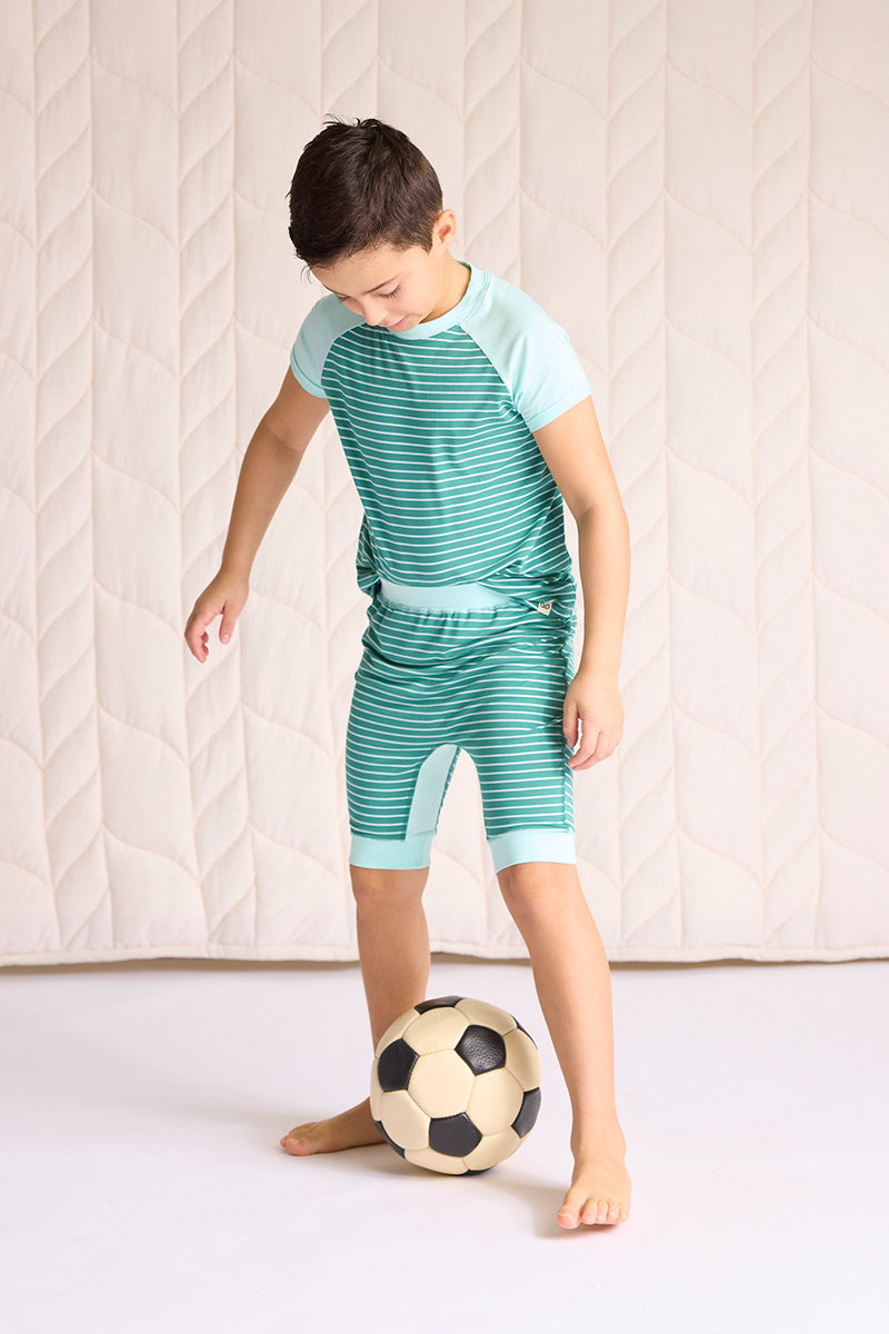 Ezra is wearing a size 7/8