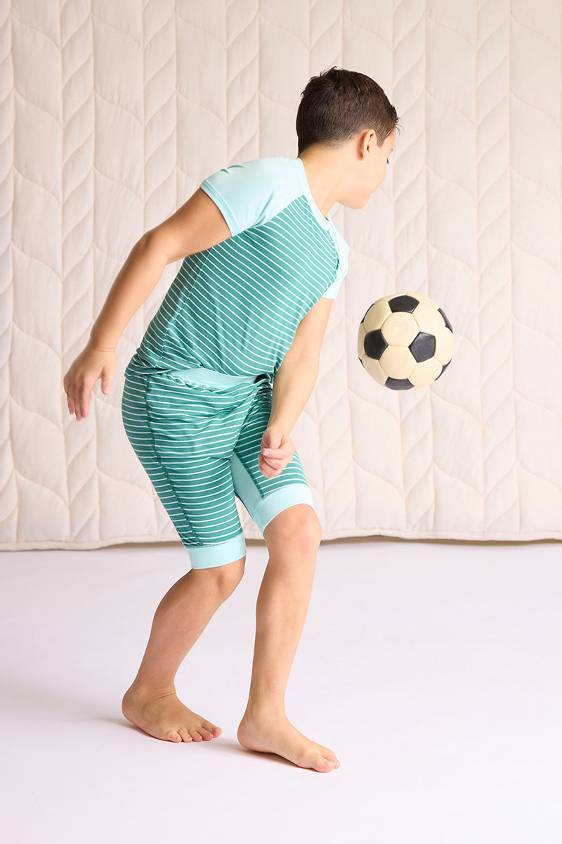 Ezra is wearing a size 7/8