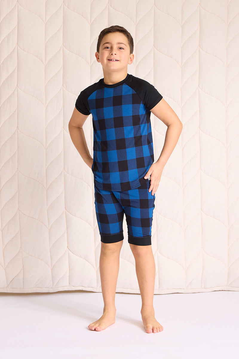 Ezra is wearing a size 7/8