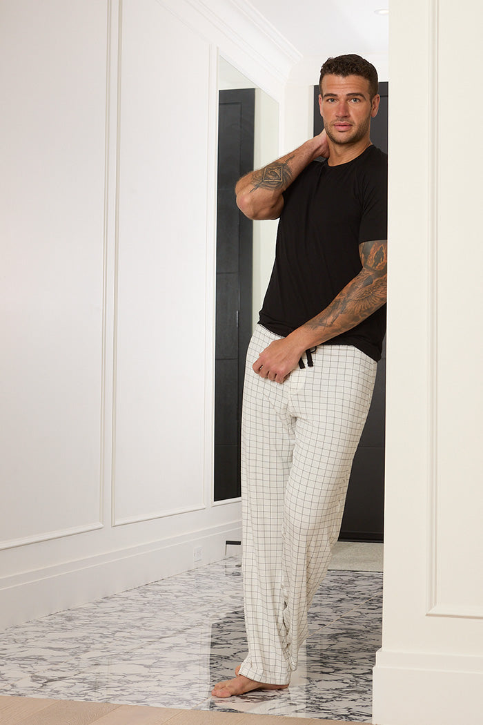 Adam is 6'1", typically wears a size 34 pant, has a 43" chest and a 32" inseam and is wearing a size medium