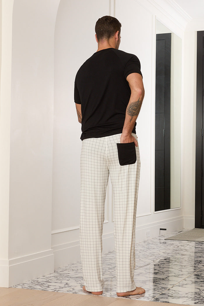 Adam is 6'1", typically wears a size 34 pant, has a 43" chest and a 32" inseam and is wearing a size medium