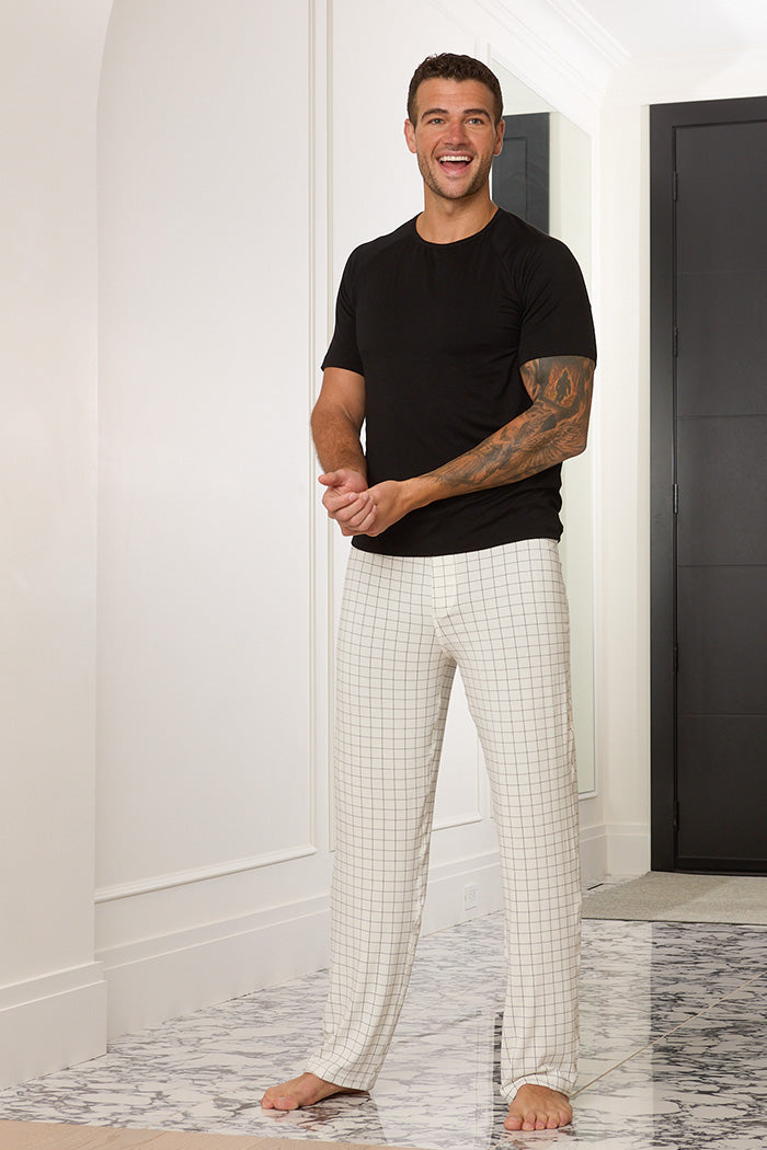 Adam is 6'1", typically wears a size 34 pant, has a 43" chest and a 32" inseam and is wearing a size medium